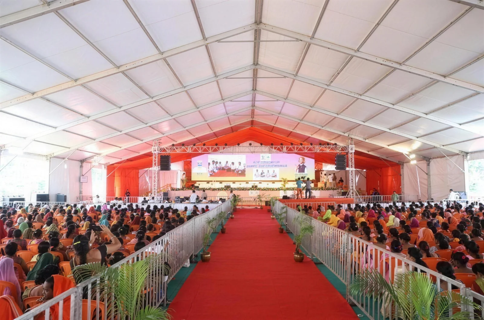 Crowd seating under a temporary structure